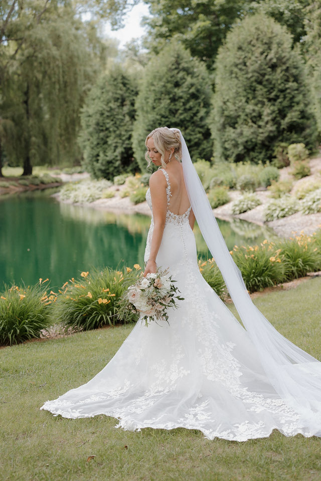 Bridal portrait by the pond