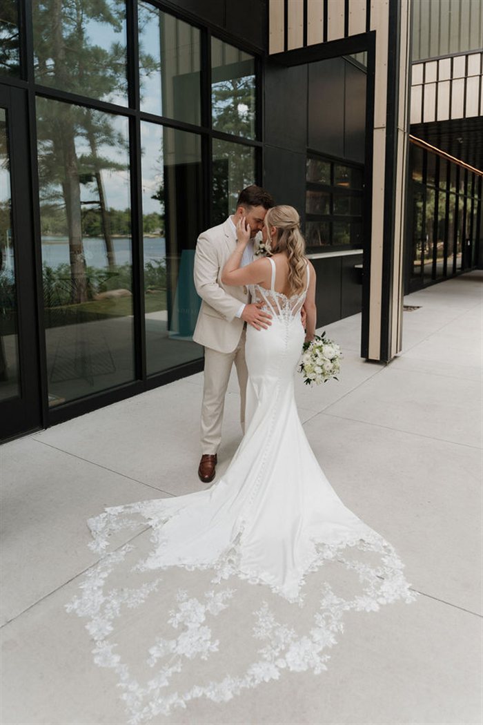 Couple outside the lakeside venue at Catalyst by Nature Link