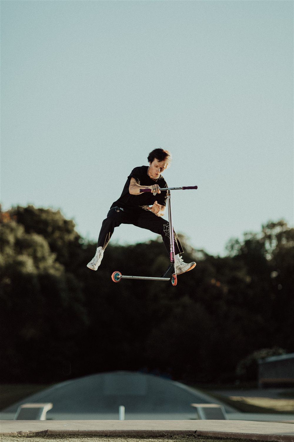 Senior portrait, scooter action shot