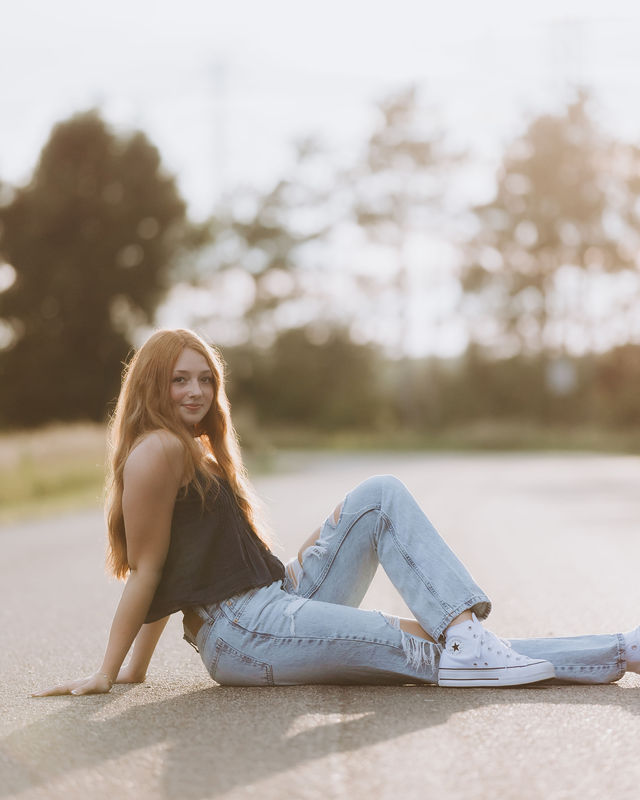 Senior portrait on a country road